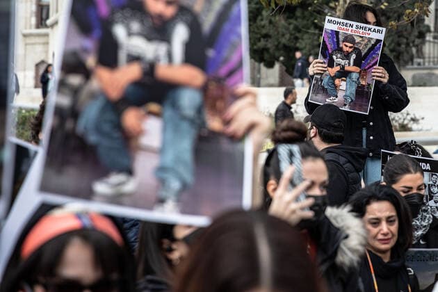 December 10, 2022, Istanbul, Turkey: A protester seen holding a placard during the demonstration. Mahsa Amini s death has sparked weeks of violent protests across Iran and other countries. Mahsa fell into a coma and died after being arrested in Tehran by the morality police for allegedly violating the country s hijab rules. In the trials regarding the protests, 11 people have been sentenced to death so far. Istanbul Turkey - ZUMAs197 20221210_zaa_s197_179 Copyright: xOnurxDogmanx