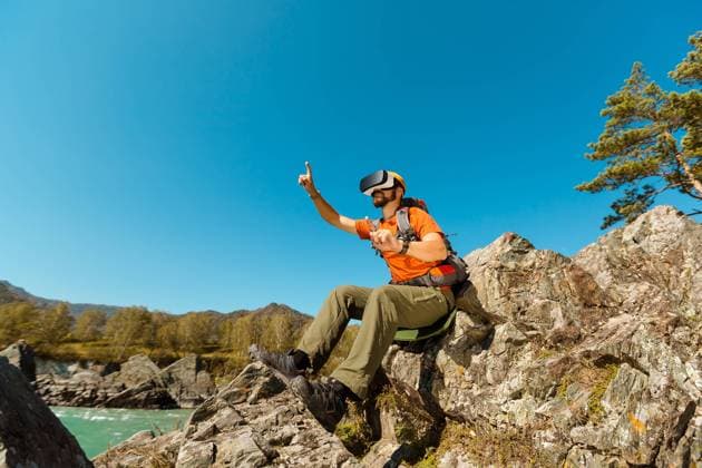 RECORD DATE NOT STATED Successful young man, using virtual reality goggles to tour in the mountains, on vacation in the summer, model released, , 23210308.jpg, vr, reality, virtual, men, device, man, video, technology, glasses, vision, headset, entertainment, digital, 3d, game, visual, science, innovation, tech, watching, hi- tech, gaming, console, industry, leisure, looking, male, people, experience, future, smartphone, simulation, electronic, simulator, recreational, futuristic, modern, 360, virtual world, helmet, concept, goggles, interface, intelligence, oculus, rift, Outdoors, mountains, traveling, successful,
