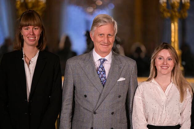 Winner Fien Engelen, King Philippe - Filip of Belgium and Winner Lea Defour pose for the photographer during the award ceremony of the 2022 edition of the Belgodyssee prize for young journalists, at the Royal Palace in Brussels, Tuesday 13 December 2022. The contest is an initiative of the Prince Philippe Fund, the VRT and the RTBF, in collaboration with Metro and L Avenir, and with the support of the Chancellery of the Prime Minister and Brussels Airlines.  LAURIExDIEFFEMBACQ 55994705