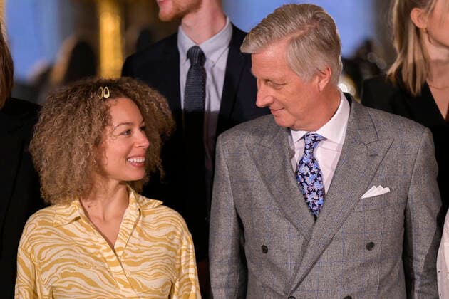 Belgian singer Lubiana and King Philippe - Filip of Belgium pictured during the award ceremony of the 2022 edition of the Belgodyssee prize for young journalists, at the Royal Palace in Brussels, Tuesday 13 December 2022. The contest is an initiative of the Prince Philippe Fund, the VRT and the RTBF, in collaboration with Metro and L Avenir, and with the support of the Chancellery of the Prime Minister and Brussels Airlines.  LAURIExDIEFFEMBACQ 55995227