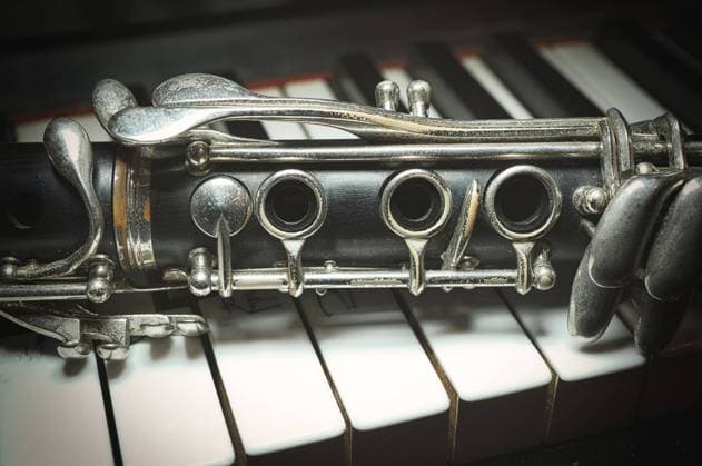 Detail a antique Clarinet, the on Piano rejects 1104300022 ,model released, Symbolfoto