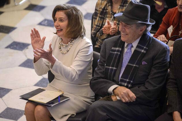 Speaker of the House Nancy Pelosi, D-CA, and her husband, Paul Pelosi, laugh during her portrait unveiling ceremony in Statuary Hall at the U.S. Capitol in Washington, DC on Wednesday, December 14, 2022. Pelosi is the first female speaker of the house.  WAP20221214331 BONNIExCASH