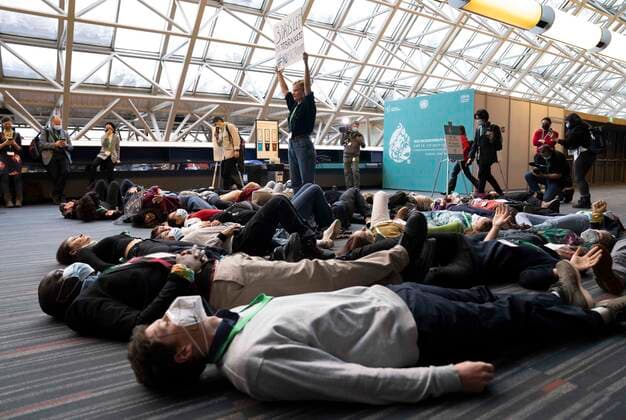 December 16, 2022, Montreal, PQ, Canada: Members of the Global Youth Biodiversity Network demonstrate in the halls of the convention centre at the COP15 UN conference on biodiversity in Montreal, on Friday, December 16, 2022. Montreal Canada  - ZUMAc35_ 20221216_zaf_c35_035 Copyright: xPaulxChiassonx