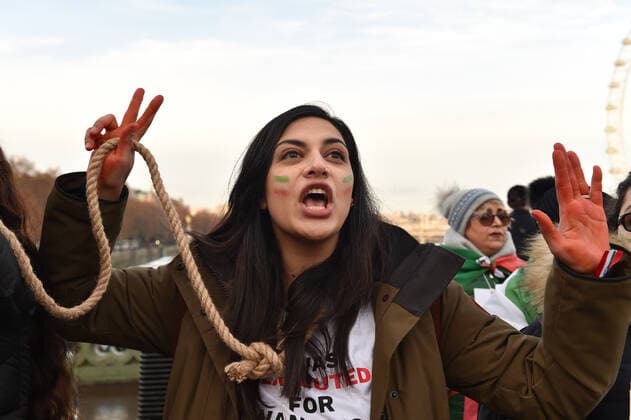 December 17, 2022, London, England, United Kingdom: Protesters take part in a demonstration in central London, calling to stop executions of protesters in Iran, and in solidarity with the freedom uprising in Iran, over the death of Mahsa Amini in custody, by Iranian morality police. Mahsa Amini was killed on 16 September, after her arrest for allegedly breaching Iran s laws for women on wearing hijab, headscarves and modest clothing. London United Kingdom - ZUMAk172 20221217_zip_k172_015 Copyright: xThomasxKrychx