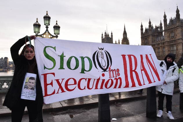December 17, 2022, London, England, United Kingdom: Protesters take part in a demonstration in central London, calling to stop executions of protesters in Iran, and in solidarity with the freedom uprising in Iran, over the death of Mahsa Amini in custody, by Iranian morality police. Mahsa Amini was killed on 16 September, after her arrest for allegedly breaching Iran s laws for women on wearing hijab, headscarves and modest clothing. London United Kingdom - ZUMAk172 20221217_zip_k172_018 Copyright: xThomasxKrychx