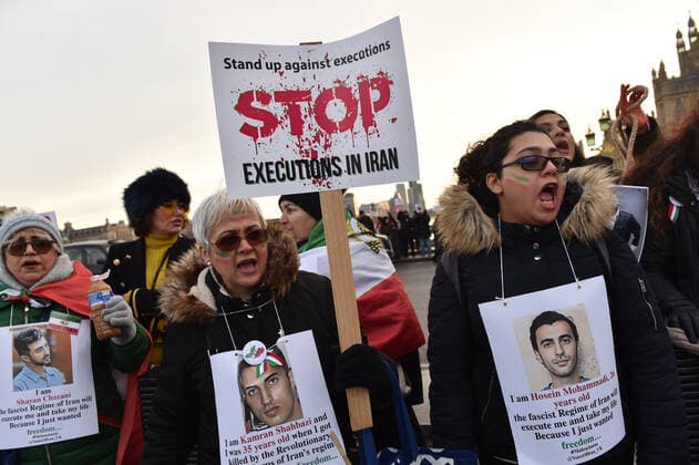 December 17, 2022, London, England, United Kingdom: Protesters take part in a demonstration in central London, calling to stop executions of protesters in Iran, and in solidarity with the freedom uprising in Iran, over the death of Mahsa Amini in custody, by Iranian morality police. Mahsa Amini was killed on 16 September, after her arrest for allegedly breaching Iran s laws for women on wearing hijab, headscarves and modest clothing. London United Kingdom - ZUMAk172 20221217_zip_k172_019 Copyright: xThomasxKrychx