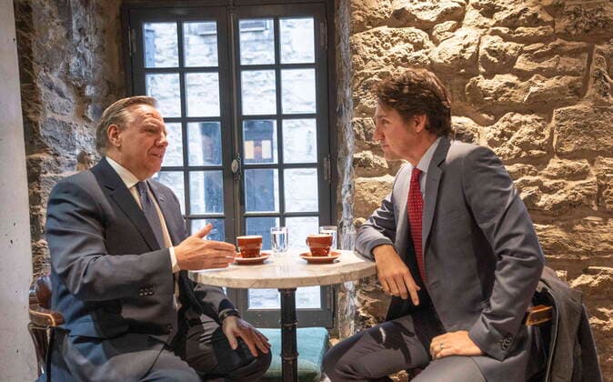 December 20, 2022, Montreal, PQ, Canada: Prime Minister Justin Trudeau and Quebec Premier Francois Legault chat over coffee in a coffee shop in Montreal, on Tuesday, December 20, 2022. Montreal Canada  - ZUMAc35_ 20221220_zaf_c35_007 Copyright: xPaulxChiassonx