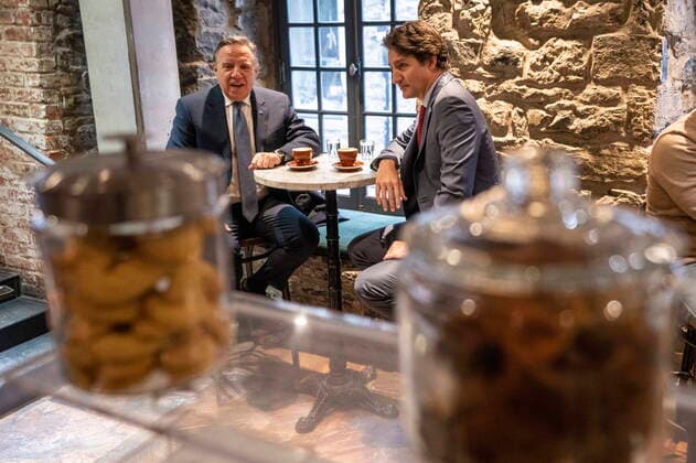 December 20, 2022, Montreal, PQ, Canada: Prime Minister Justin Trudeau and Quebec Premier Francois Legault chat over coffee in a coffee shop in Montreal, on Tuesday, December 20, 2022. Montreal Canada  - ZUMAc35_ 20221220_zaf_c35_010 Copyright: xPaulxChiassonx