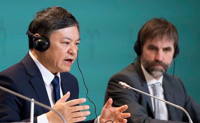 December 20, 2022, Montreal, PQ, Canada: Huang Runqiu, Minister of Ecology and Environment of China and president of the COP15, responds to a question as Canadian Environment Minister Steven Guilbeault looks on during the closing news conference at the COP15 UN conference on biodiversity in Montreal, on Tuesday, December 20, 2022. Montreal Canada  - ZUMAc35_ 20221220_zaf_c35_016 Copyright: xPaulxChiassonx