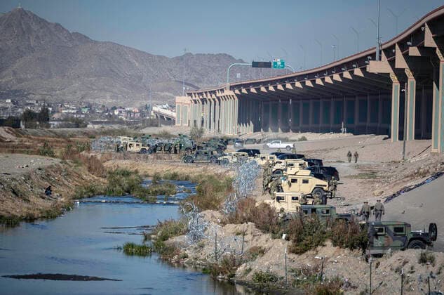 December 20, 2022, Ciudad Juarez, Chihuahua, USA: .U.S brings military to reenforce U.S.-Mexico Border in El Paso along the Rio Bravo to prevent from immigrants seeking asylum from entering the United States. .Ciudad Juarez, Mexico Albuquerque Journal Ciudad Juarez USA - ZUMAab1_ 20221220_zaf_ab1_004 Copyright: xRobertoxE.xRosalesx