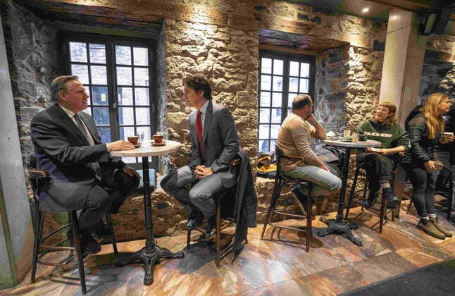 December 20, 2022, Montreal, PQ, Canada: Prime Minister Justin Trudeau and Quebec Premier Francois Legault chat over coffee in a coffee shop in Montreal, on Tuesday, December 20, 2022. Montreal Canada  - ZUMAc35_ 20221220_zaf_c35_008 Copyright: xPaulxChiassonx