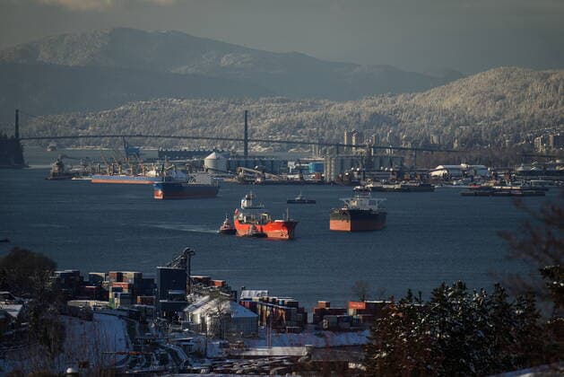 December 21, 2022, BURNABY, BC, CANADA: Tugboats escort the chemical tanker Zao Galaxy through the harbour as snow covers trees on the north shore mountains, in Vancouver, on Wednesday, December 21, 2022. A snowstorm dumped more than 30 centimetres of snow in Metro Vancouver this week. BURNABY CANADA  - ZUMAc35_ 20221221_zaf_c35_047 Copyright: xDarrylxDyckx