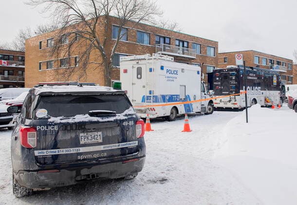 December 27, 2022, Montreal, PQ, Canada: Police vehicles are shown outside an apartment building where two people were found dead in Montreal,Tuesday, December 27, 2022. Montreal police say a man and woman have died in the city s east end after what s believed to be a murder-suicide. Montreal Canada  - ZUMAc35_ 20221227_zaf_c35_006 Copyright: xGrahamxHughesx