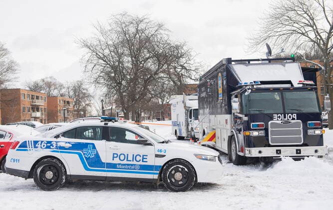 December 27, 2022, Montreal, PQ, Canada: Police vehicles are shown outside an apartment building where two people were found dead in Montreal,Tuesday, December 27, 2022. Montreal police say a man and woman have died in the city s east end after what s believed to be a murder-suicide. Montreal Canada  - ZUMAc35_ 20221227_zaf_c35_007 Copyright: xGrahamxHughesx