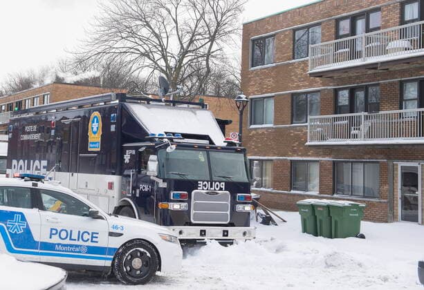 December 27, 2022, Montreal, PQ, Canada: Police vehicles are shown outside an apartment building where two people were found dead in Montreal,Tuesday, December 27, 2022. Montreal police say a man and woman have died in the city s east end after what s believed to be a murder-suicide. Montreal Canada  - ZUMAc35_ 20221227_zaf_c35_008 Copyright: xGrahamxHughesx