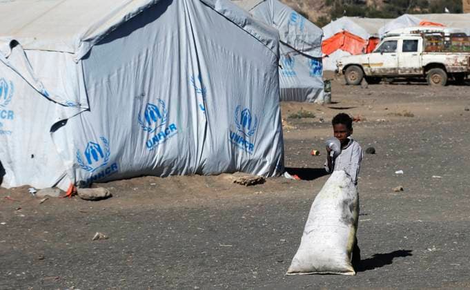 (230101) -- SANAA, Jan. 1, 2023 -- A child is seen inside the Dharawan camp, in the northern suburb of Sanaa, Yemen s capital, on Dec. 7, 2022. TO GO WITH Feature: Displaced Yemenis struggle in cold winter amid endless civil war (Photo by Xinhua) YEMEN-SANAA-REFUGEE CAMP MohammedxMohammed 