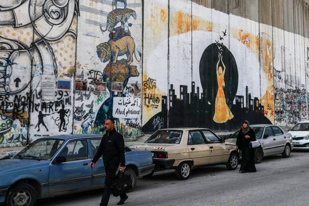 Street Art And Banksy Hotel In Bethlehem Street art graffiti and murals on the Israeli separation West Bank Wall in Bethlehem, Palestine on December 28, 2022. Bethlehem Palestine  Copyright: xBeataxZawrzelx originalFilename: zawrzel-streetar221228_npe3q.jpg