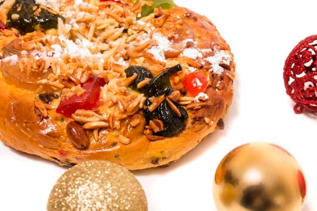 RECORD DATE NOT STATED Portuguese King Cake is a famous christmas celebration cake with dry nuts and crystalized fruits. , 25769734.jpg, almond, background, baked, bakery, cake, christmas, colorful, crystallized, cuisine, dry, fig, fluffy, food, fruit, gastronomy, glace, grape, icing, isolated, king, nut, pastry, pine, pinea, pinus, portugal, portuguese, raisin, round, seasonal, seed, sugar, sweet, tasty, top, tradition, traditional, typical, view, white, xmas, balls,