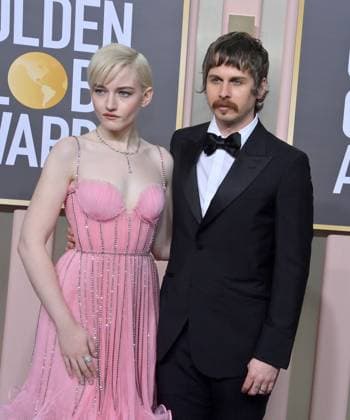 (L-R) Julia Garner and Mark Foster arrive for the 80th annual Golden Globe Awards at the Beverly Hilton in Beverly Hills, California on Tuesday, January 10, 2023.  LAP20230110257 JIMxRUYMEN