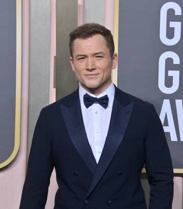 Taron Egerton arrives for the 80th annual Golden Globe Awards at the Beverly Hilton in Beverly Hills, California on Tuesday, January 10, 2023.  LAP20230110526 JIMxRUYMEN