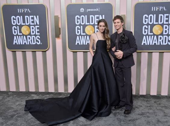Hannah Bagshawe and Eddie Redmayne arrive for the 80th annual Golden Globe Awards at the Beverly Hilton in Beverly Hills, California on Tuesday, January 10, 2023.  LAP20230110697 JIMxRUYMEN
