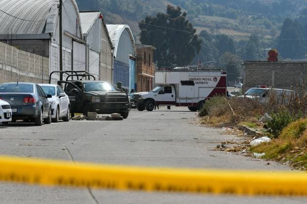 More than 20 bags with human remains found in clandestine grave in the State of Mexico January 13 in Tenango del Valle, Mexico : Forensic experts of the State of Mexico carry out the diligences where were found in a clandestine grave inside an industrial warehouse at least 26 packages with human remains; Military in company of the police of the State of Mexico guard the perimeter. on January 13 in Tenango del Valle, MÃ xico. (Photo by Arturo Hernandez Eyepix Group) Copyright: xArturoxHernandezx xEyepixxGroupx AH_130123_02