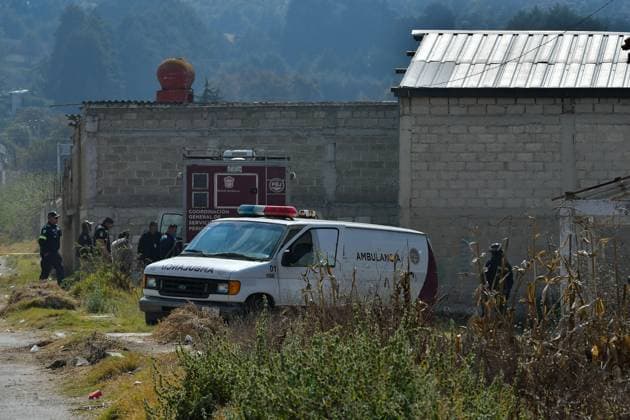 More than 20 bags with human remains found in clandestine grave in the State of Mexico January 13 in Tenango del Valle, Mexico : Forensic experts of the State of Mexico carry out the diligences where were found in a clandestine grave inside an industrial warehouse at least 26 packages with human remains; Military in company of the police of the State of Mexico guard the perimeter. on January 13 in Tenango del Valle, MÃ xico. (Photo by Arturo Hernandez Eyepix Group) Copyright: xArturoxHernandezx xEyepixxGroupx AH_130123_10
