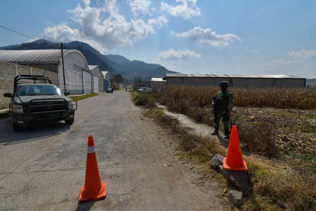 More than 20 bags with human remains found in clandestine grave in the State of Mexico January 13 in Tenango del Valle, Mexico : Forensic experts of the State of Mexico carry out the diligences where were found in a clandestine grave inside an industrial warehouse at least 26 packages with human remains; Military in company of the police of the State of Mexico guard the perimeter. on January 13 in Tenango del Valle, MÃ xico. (Photo by Arturo Hernandez Eyepix Group) Copyright: xArturoxHernandezx xEyepixxGroupx AH_130123_11