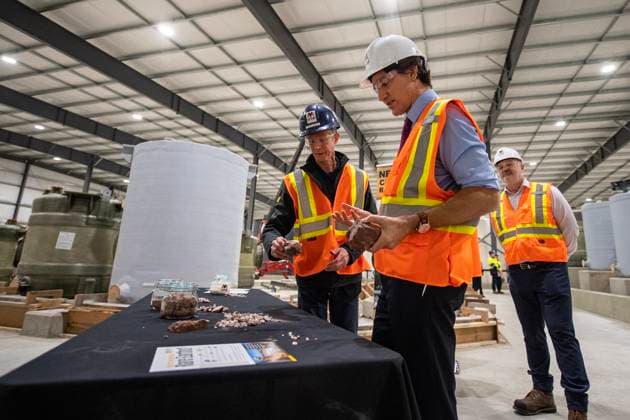 January 17, 2023, Saskatoon, SK, Canada: Prime Minister Justin Trudeau, right, speaks with Vincent Laniece, with Vital Metals during a tour of the Vital Metals rare earths element processing plant in Saskatoon, on Monday, January 16, 2023. Saskatoon Canada - ZUMAc35_ 20230117_zaf_c35_029 Copyright: xLiamxRichardsx