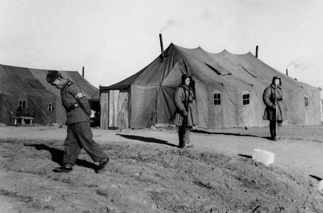 RECORD DATE NOT STATED Sentries in front of the tent which hosts the Panmunjeom negotiations, Korea 1952 01 02 1952 972_33_W345646