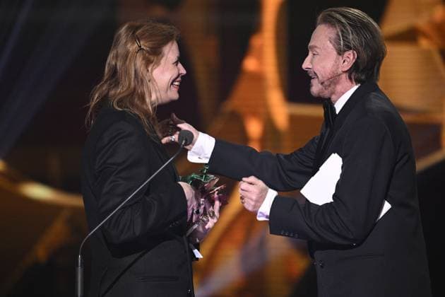 STOCKHOLM 20230123 Sofie Krunegard receives the award for best costume design for the film Triangle of Sadness from award winner Christer Lindarw during the Guldbaggegala at Cirkus in Stockholm STOCKHOLMK SWEDEN x10040x,  Copyright: xAndersxWiklund TTx GULDBAGGEN 2023 TTABB0000000000154522