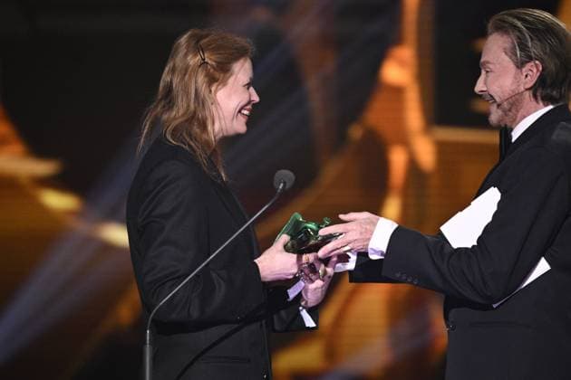 STOCKHOLM 20230123 Sofie Krunegard receives the award for best costume design for the film Triangle of Sadness from award winner Christer Lindarw during the Guldbaggegala at Cirkus in Stockholm STOCKHOLMK SWEDEN x10040x,  Copyright: xAndersxWiklund TTx GULDBAGGEN 2023 TTABB0000000000154523