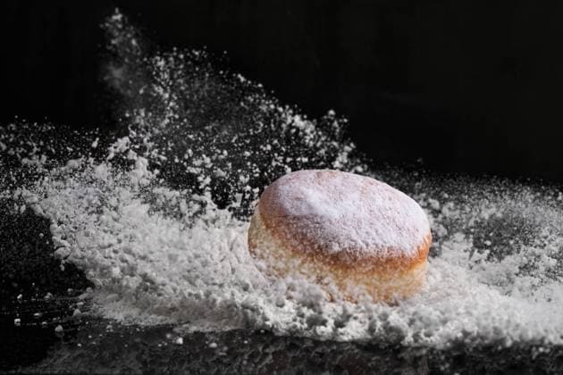 RECORD DATE NOT STATED Berliner donut with jam stuffed falls into flour on black background. , 33619934.jpg, donut, food, berliner, closeup, delicious, dessert, sweet, german, sugar, baked, cake, pastry, carnival, jam, bakery, breakfast, powdered sugar, party, traditional, tasty, holiday, tradition, new year, photography, government, expertise, eat, jelly, sweet food, biscuit, celebration, silvester, snack, doughnut, round, flour, falls