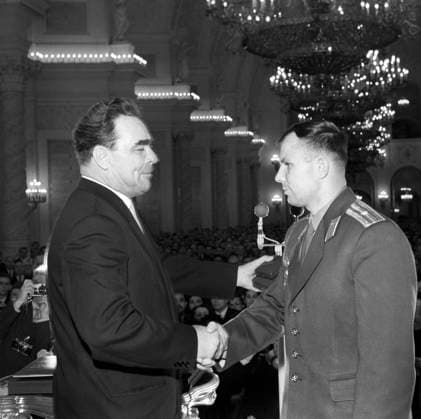 Moscow, USSR. April 14, 1961. Chairman of the Presidium of the Supreme Soviet of the USSR Leonid Brezhnev awards Soviet cosmonaut, Major Yuri Gagarin (L-R), who made the world s first space flight on April 12, 1961 on the Vostok 1 spacecraft, the Order of Lenin and the Golden Star medal of the Hero of the Soviet Union in the St. George Hall of the Grand Kremlin Palace. Vladimir Savostyanov TASS  1469211
