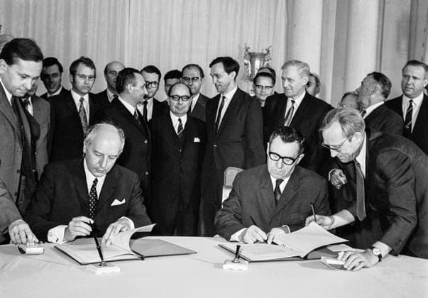 Moscow, USSR. August 7, 1970. USSR Foreign Minister Andrey Gromyko and Vice-Chancellor, Foreign Minister of the Federal Republic of Germany Walter Scheel (R-L, foreground) initial the text of the Agreement between the FRG and the USSR on the recognition of European territorial and political realities after World War II. Alexey Stuzhin TASS  16965024