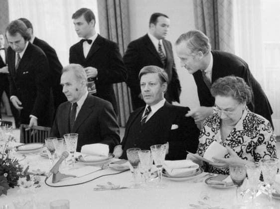 Moscow, USSR. October 29, 1974. Chairman of the Council of Ministers of the USSR Alexei Kosygin, Chancellor of the Federal Republic of Germany Helmut Schmidt and wife of Leonid Brezhnev Victoria Petrovna (L-R front) attend a breakfast given by H. Schmidt. Vladimir Musaelyan, Valentin Sobolev TASS  32418575