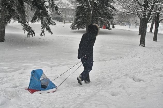 Heavy Snow Hits Toronto Woman pulls her child along the snow during a snowstorm in Toronto, Ontario, Canada, on January 29, 2023. The storm is expected to drop around 10 centimeters of snow across the Greater Toronto Area. Toronto Ontario Canada  Copyright: xCreativexTouchxImagingxLtdx originalFilename: friedman-heavysno230129_npB0d.jpg