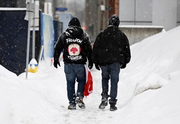 January 29, 2023, Ottawa, ON, CAN: Freedom Convoy supporters walk away from Parliament Hill as they mark the one-year anniversary of the Freedom Convoy in Ottawa, on Sunday, Jan. 29, 2023. Ottawa CAN  - ZUMAc35_ 20230129_zaf_c35_005 Copyright: xJustinxTangx