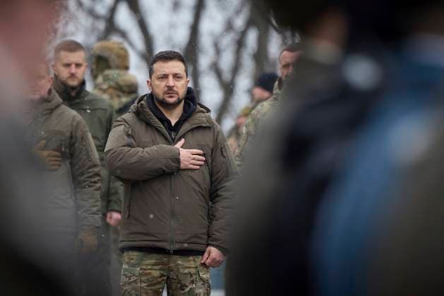 January 29, 2023, Kyiv, Ukraine: Ukrainian President Volodymyr Zelenskyy stands for the national anthem during a commemoration on Kruty Heroes Remembrance Day at the AskoldÃ¢â‚¬â ¢s Grave memorial site, January 29, 2023 in Kyiv, Ukraine. The memorial is in remembrance of the heroes of the Ukrainian Revolution of 1917-1921. Kyiv Ukraine - ZUMAp138 20230129_zaa_p138_023 Copyright: xUkrainexPresidency UkrainianxPrex