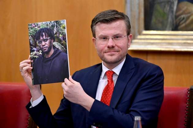 Nurembergs Lord Mayor Marcus König CSU at the presentation of the winner for the Nuremberg Human Rights Award 2023 The International Nuremberg Human Rights Award 2023 goes to Malcolm Bidali from Kenya seen in the picture held for his work against the exploitation of migrant workers Nuremberg, 30 01 2023 Bavaria Germany Copyright: xDwixAnoraganingrumx