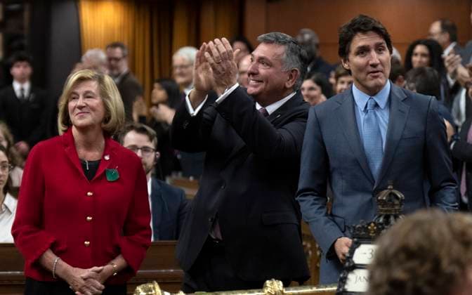 January 30, 2023, Ottawa, ON, Canada: Public Services and Procurement Minister Helena Jaczek (left) looks on as Charles Sousa applauds the gallery as Prime Minister Justin Trudeau introduces him in the House of Commons before Question Period, Monday, January 30, 2023 in Ottawa. Ottawa Canada  - ZUMAc35_ 20230130_zaf_c35_074 Copyright: xAdrianxWyldx