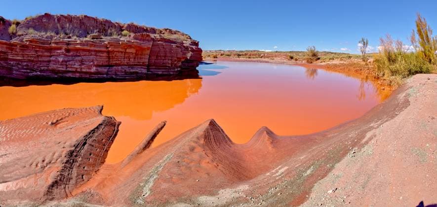 Creative Highlights World The red water of Lithodendron Wash, red from bentonite clay, in Petrified Forest National Park, Arizona, United States of America, North America Copyright: StevenxLove 1311-538