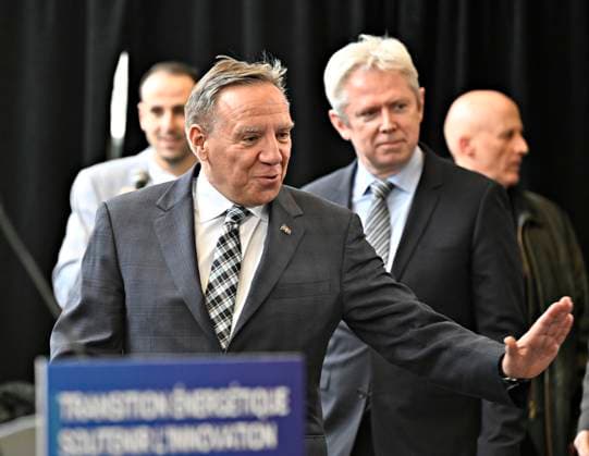 February 2, 2023, QUEBEC, PQ, Canada: Quebec Premier Francois Legault walks in to announce the implantation of a green hydrogen train in the Charlevoix region, Thursday, February 2, 2023 in Quebec City. Alsthom America president Michael Keroulle walks behind. QUEBEC Canada  - ZUMAc35_ 20230202_zaf_c35_032 Copyright: xJacquesxBoissinotx