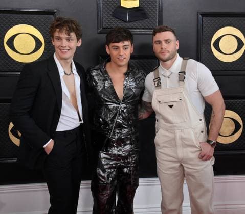 (L-R) Hunter Doohan, Tom Daley and Gus Kenworthy attend the 65th annual Grammy Awards at the Crypto.com Arena in Los Angeles on Sunday, February 5, 2023.  LAP20230205313 JIMxRUYMEN