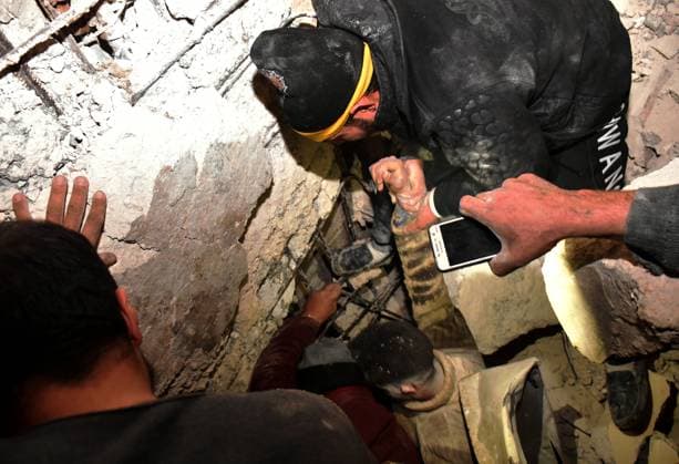 (230206) -- HAMA, Feb. 6, 2023 -- Rescue work is in progress after a deadly earthquake in Hama province, central Syria, Feb. 6, 2023. Syria s deadly earthquake has so far killed 237 people and injured 639 others in four provinces, the health ministry said in a statement Monday. A major earthquake of magnitude 7.4 knocked down multiple buildings in southern T¨¹rkiye and northern Syria on Monday. (Str Xinhua) SYRIA-HAMA-EARTHQUAKE-AFTERMATH AmmarxSafarjalani 