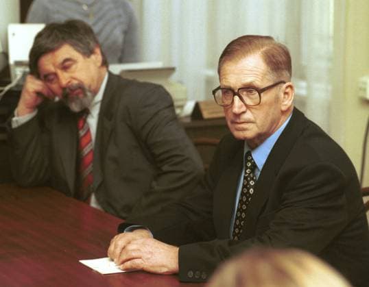 ***FILE PHOTO*** Lubomir Strougal, right, former prime minister of communist Czechoslovakia who is charged with abuse of power, at Prague district court, on Wednesday, February 20, 2002. On the left side is seen his lawyer Josef Lzicar. *** Czechoslovak communist-era PM, interior, agriculture minister Strougal died aged 98, source close to his family told Czech News Agency (CTK)xonxFebruaryx6,x2023.x(CTKxPhoto RenexVolfik) CTKPhotoFO00372689  CTKPhotoFO00372689