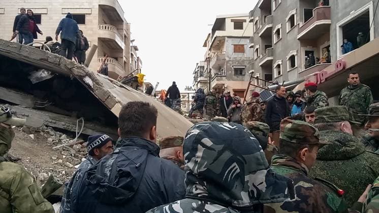 SYRIAN ARAB REPUBLIC, LATAKIA - FEBRUARY 6, 2023: Local residents and Russian and Syrian servicemen clear the debris after an earthquake. A major earthquake measuring 7.7 on the Richter scale struck southern Turkey and northwest Syria early on February 6 killing more than 1,000 people and injuring 2,400. Video grab. Best quality available. Russian Defence Ministry TASS  57223968
