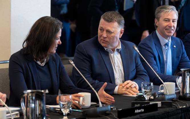 February 7, 2023, Ottawa, ON, Canada: P.E.I. Premier Dennis King speaks with Alberta Premier Danielle Smith as Nova Scotia Premier Tim Houston looks on before a meeting of CanadaöÄÃ s premiers, Tuesday, February 7, 2023 in Ottawa. Ottawa Canada  - ZUMAc35_ 20230207_zaf_c35_007 Copyright: xAdrianxWyldx
