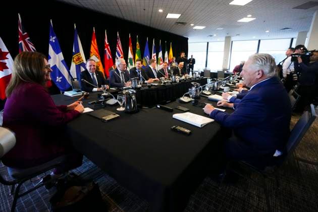 February 7, 2023, Ottawa, ON, Canada: Manitoba Premier Heather Stefanson, left, talks to Quebec Premier Francois Legault, back left, and Ontario Premier Doug Ford, right, as she chairs a meeting with Canada s premiers in Ottawa on Tuesday, Feb. 7, 2023 in Ottawa. Ottawa Canada - ZUMAc35_ 20230207_zaf_c35_011 Copyright: xSeanxKilpatrickx