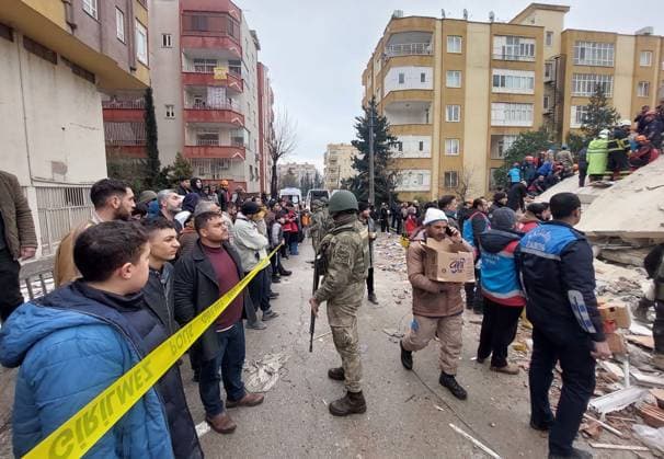 Turkish soldiers guard while rescue teams search for victims in the rubble on the second day following an earthquake in Kahramanmaras, Turkey on Tuesday, February 7, 2023. More than 5,000 people have been killed and tens of thousands injured after a 7.8-magnitude earthquake hit Turkey and Syria on Monday, officials from both countries reported.  TUR2023020743 TurkishxDefensexMinistry